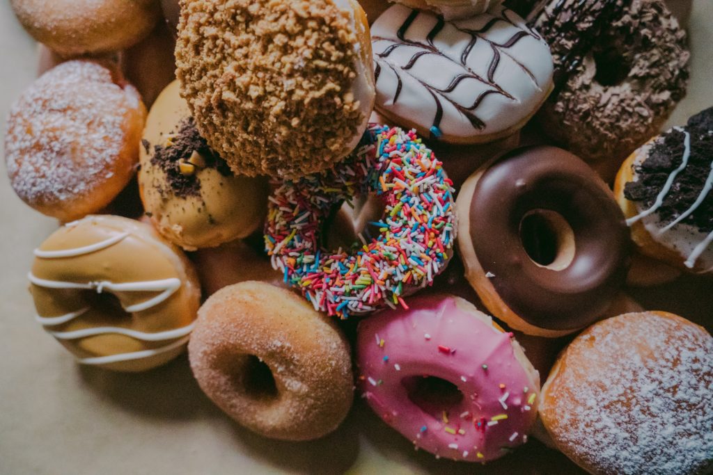 A pile of different types of doughnuts