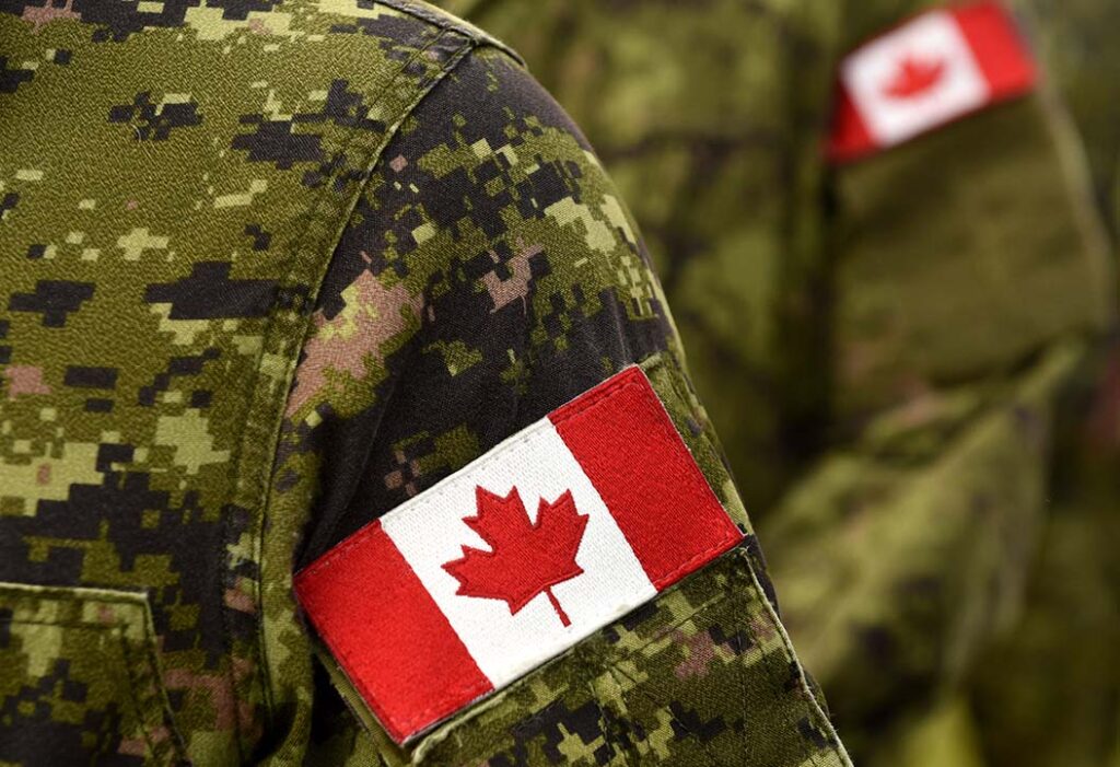 Canadian flag patch on soldier's uniform