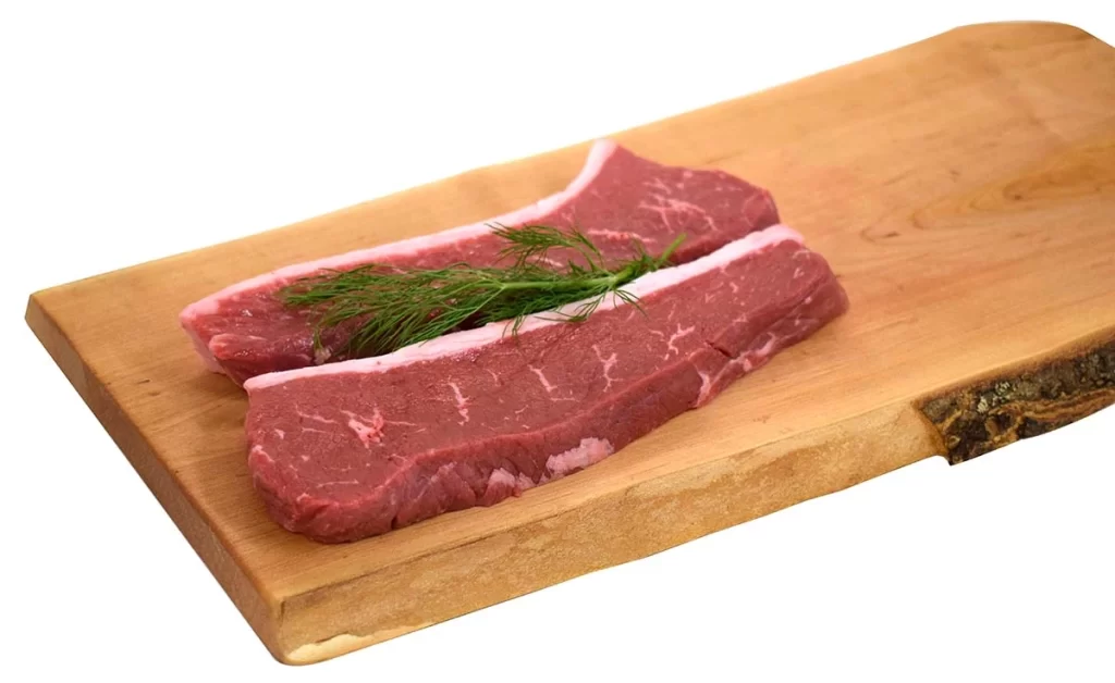 Butcher's Choice steak on a wooden plank