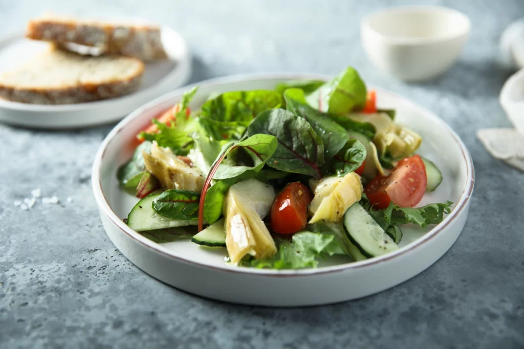 A salad with Ontario artichokes, tomatoes, and potatoes